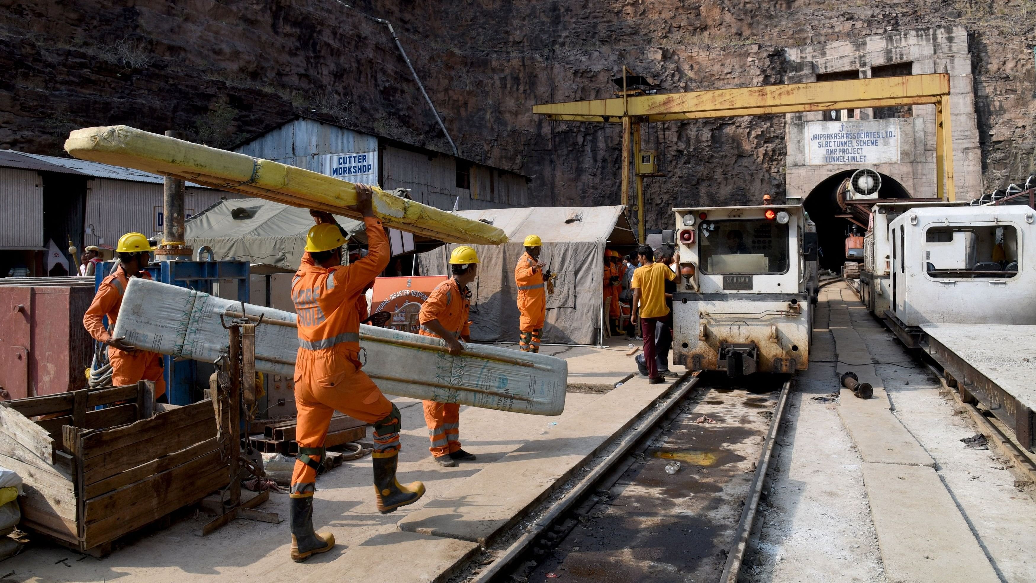 <div class="paragraphs"><p>Members of National Disaster Response Force  working after a portion of the tunnel collapsed, in Nagarkurnool district in the southern state of Telangana.&nbsp;</p></div>