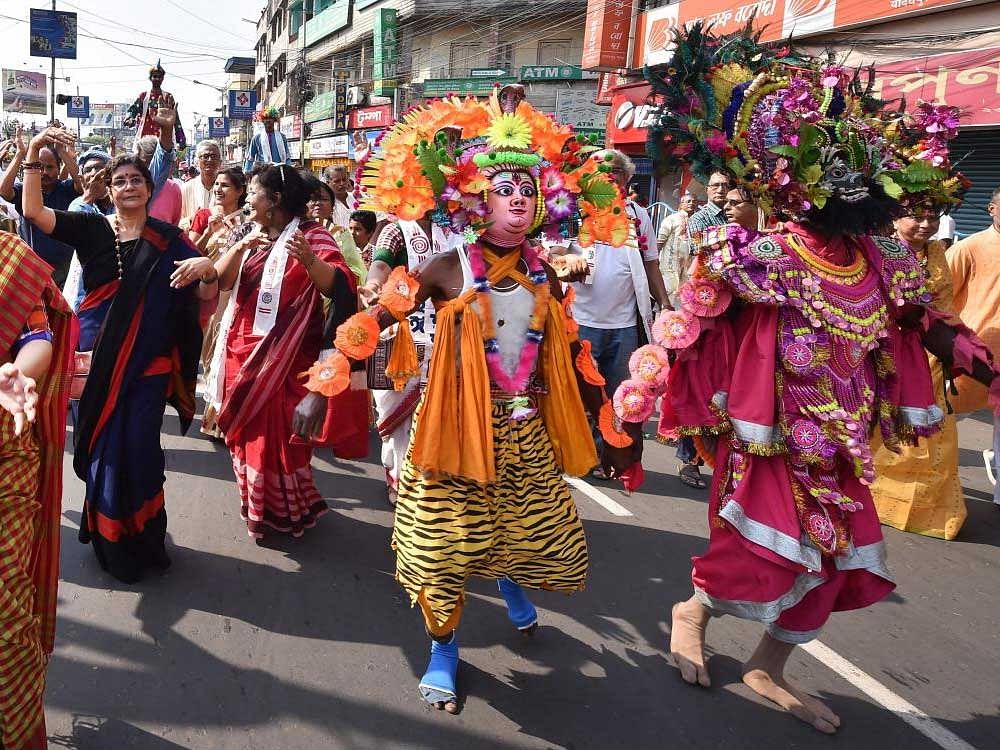 People take part in a procession to celebrate Bengali New Year, in Kolkata on Sunday. PTI Photo