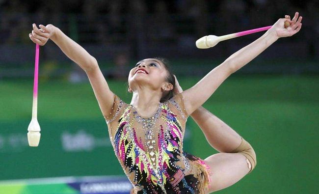 Rhythmic Gymnastics: Izzah Amzan of Malaysia competes. Reuters Photo