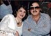 COMPLEMENTING  :Zarine and Sanjay Khan.