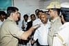 DySP Krishna Bhat reasoning with members of the Bangalore Advocates Association,  following their protest against the police