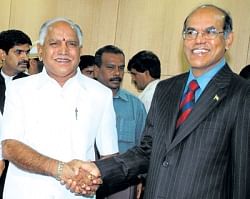 Seeking aid: Chief Minister B S Yeddyurappa greeting RBI Governor D Subbarao in Bangalore on Thursday. DH Photo
