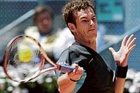 Briton Andy Murray returns during his pre-quarterfinal win over Spains Tommy Robredo in the Madrid Open on Thursday. AFP