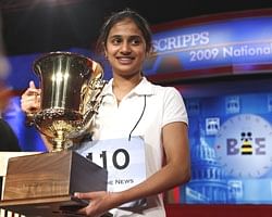 Kavya Shivashankar from Olathe, Kansas, lifts the trophy after winning the 2009 National Spelling Bee in Washington on Thursday. Reuters