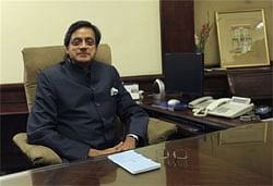 Junior Foreign Minister Shashi Tharoor looks on at his office in New Delhi, Friday. AP