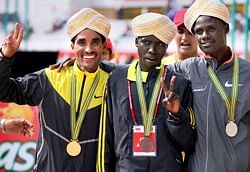 Winners of World 10K Elite Men Marathon, Deriba Mergz of Ethopia (L), Runner UP Kenyan Mark Kiptoo (C) and 2nd Runner UP Kenyan Bemard Kipyego