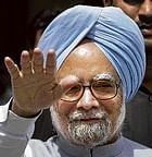 Prime Minister Manmohan Singh waves to the media on the opening day of the Lok Sabha session on Monday. AP