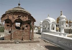 A damaged dome with bullet marks inside the complex of the Golden Temple, Sikh's holiest shrine. AP