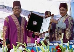 Oscar-winner music maestro A R Rahman being honoured with an honorary degree by the Aligarh Muslim University in Aligarh on Sunday. PTI