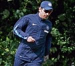 WARMING-UP MS Dhoni prior to Indias practice session in Nottingham on Monday. AP