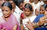 Bride Lakshmi with her relatives after her refusal to marry at mass marriage event in Kengeri on Friday. DH photo