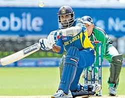 Mahela Jayawardene of Sri Lanka plays a shot as Ireland wicketkeeper Niall OBrien looks on during the Super Eight stage of the ICC World Twenty20 Cup