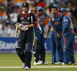 England captain Paul Collingwod walks off after being caught lbw to India's Zaheer Khan (2nd from left). AP