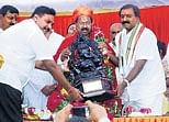 Felicitation: Legislator N Sampangi felicitating Union Minister for Law M Veerappa Moily in Bagepalli on Monday, at a function organised by the Congre