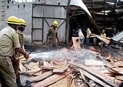 Fire personnel in action at the plywood factory in Hubli on Monday. KPN