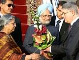 Prime Minister Manmohan Singh with his wife Gulsharan Kaur being welcomed at airport in Yekaterinburg (Russia) on the eve of the BRIC Summit on Monday