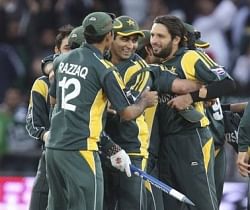 Pakistan celebrates after they defeated South Africa in their semi final. Shahid Afridi  is to the far right.. AP