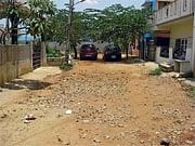 Deplorable condition: A poorly maintained road in Bhadrappa Layout.