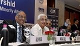 Minister for Corporate Affairs, Salman Khursheed (2nd from L) speaks to media during a function on corporate governance organised by CII in New Delhi