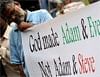 A Students Islamic Organisation of India  activist hold banner as they protest against court ruling to decriminalise gay sex in Mumbai. AFP