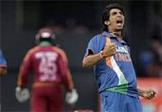 India's bowler Ishant Sharma celebrates after taking the wicket of West Indies' captain Chris Gayle, caught behind for a duck with the second ball of