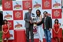 Proud moment: P V Shetty receiving the Kingfisher Derby Trophy from Sheetal Sharma and Waseem Khan.