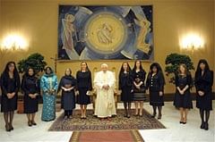 Pope Benedict XVI (C) posing with some of the First Ladies and ministers taking part in G8 summit in L'Aquila, at The Vatican. AFP