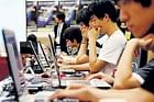 South Korean computer hackers compete during an information security olympiad in Seoul on Friday. AP.