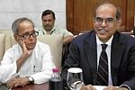 Finance Minister Pranab Mukherjee (left) with RBI Governor D Subbarao during the RBI central board meeting in New Delhi on Saturday.  PTI