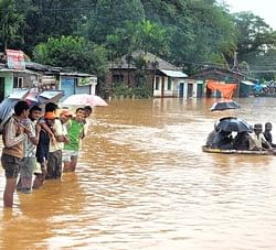 The Balehonnur-Koppa Road in Chikmagalur district submerged after the Bhadra river overflowed on Thursday. DH photo