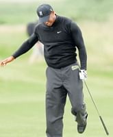 American Tiger Woods reacts after playing  a shot during the second round of the British open at Turnberry on Friday. AP