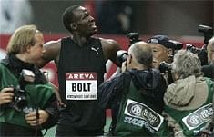 Bolt runs personal best in rain at Paris Golden League