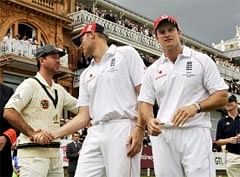 Australian captain Ricky Ponting shakes hands with  Andrew Flintoff. England captain Andrew Strauss is also seen. AFP