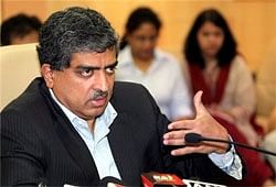Infosys co-founder Nandan Nilekani interacts with media after he takes over as the head of Unique Identification Authority of India in New Delhi. PTI