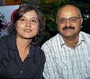 Praveen Sood with his wife.