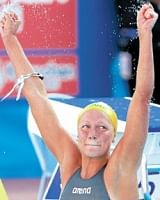 Swedens Sarah Sjostrom celebrates her gold in the 100M butterfly.  AFP