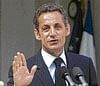 French President Nicolas Sarkozy gestures as he delivers a speech following the weekly cabinet meeting at the Elysee Palace in Paris on Wednesday. AP