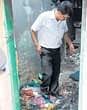 An official inspects the gutted house in Ramamurthy Nagar, Bangalore, on  Tuesday. DH PHOTO
