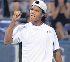 FINE WIN:  Somdev Devvarman celebrates after his win over Marin Cilic on Tuesday. AFP