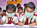 School children wearing protective masks in Ranchi on Thursday, after report of the first Swine Flu case in Jamshedpur, Jharkhand. PTI