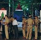 All Set: Police personnel checking the security arrangements on the eve of the unveiling of the Tiruvalluvar  statue, in Bangalore on Saturday. KPN