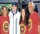 former Cuban President Fidel Castro (second from left) poses with the founder and Executive Director of the humanitarian group, Rev Lucius Walker, Jr