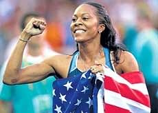 American Sanya Richards exults after clinching the womens 400M gold at the Olympic stadium in Berlin on Tuesday. AP