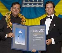 Dr Bindeshwar Pathak, left, receives the 2009 Stockholm Water Prize from Sweden's Prince Carl Philip. AP