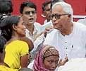 West Bengal Chief Minister Buddhadeb Bhattacharjee speaks to the family of martyrs on the  50 years of Food Movement, in Kolkata. PTI