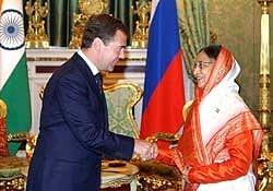 Indian President Pratibha Patil shakes hands with Russian President Dmitry Medvedev at the Kremlin in Moscow on Thursday. AFP