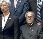 Finance Minister Pranab Mukherjee (right) with his French counterpart Christine Lagarde at the G20 summit in London on Saturday. AP