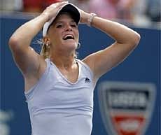 Melanie Oudin of the United States reacts after her 1-6, 7-6(2), 6-3 upset victory over Nadia Petrova of Russia .AP