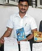 Raju Gaddi with the manuscript written in blood