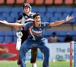 Ashish Nehra makes a plaintive, and eventually successful, appeal for leg before wicket against Brendon  McCullum .AP